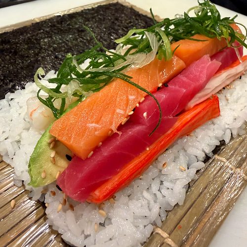 Sushi roll with salmon and tuna, from a past dinner in a villa in Guanacaste